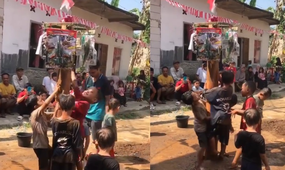 Panjat Pinang Mini tingginya cuma 2 meter, diikuti oleh anak-anak.