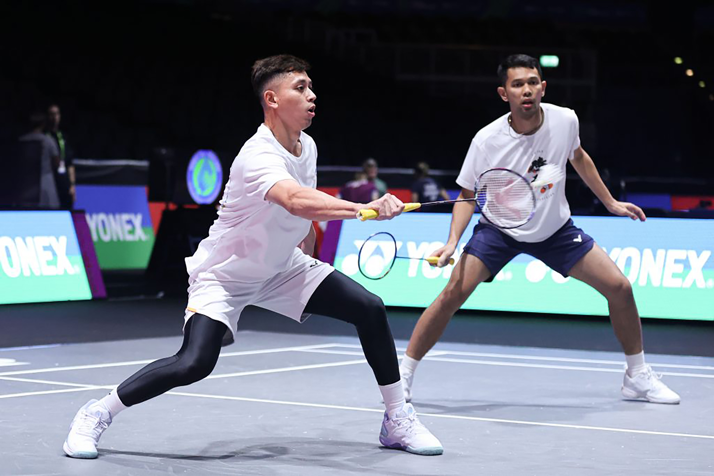 Fajar Alfian/Muhammad Rian Ardianto melaju ke babak 16 besar setelah mengandaskan wakil China, Chen Bo Yang/Liu Yi 21-17, 15-21, 21-17