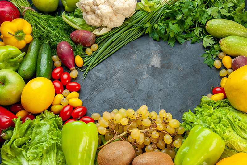 bottom view vegetables and fruits cumcuat lettuce zucchini bell peppers kiwi grapes parsley green onion cauliflower cherry tomatoes lemon free space
