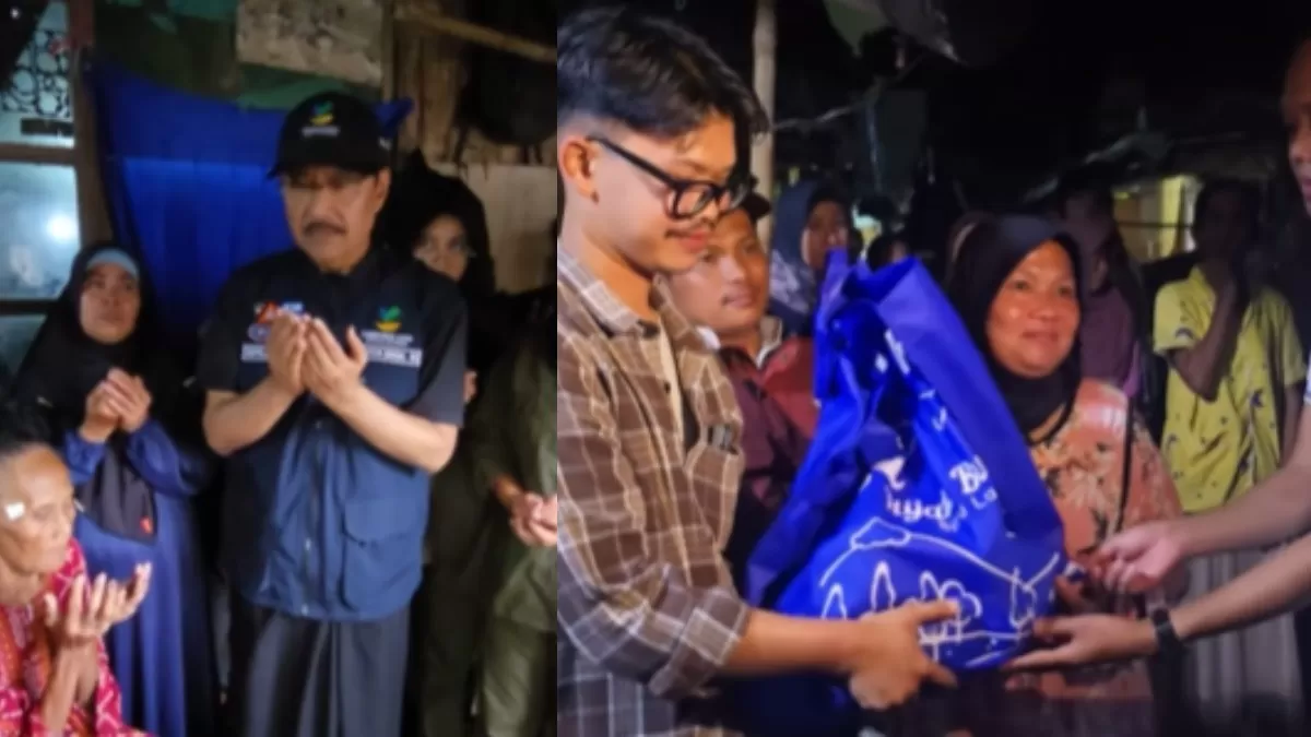 Menteri Sosial Saifullah Yusuf memberikan bantuan ke warga yang kurang mampu