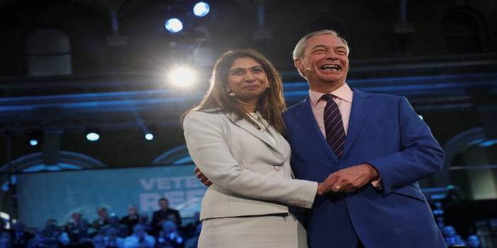 Anggota Parlemen Suella Braverman (kiri) dan Farage, pemimpin Reform UK, difoto di London pada tangal 26 Januari.  ( Sumber foto: Reuters/Isabel Infanses )