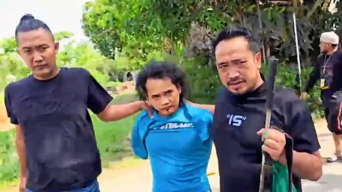 Baju biru, tampang tersangka Eko Kustiarno, 32, warga Wringinjajar, Mranggen Kabupaten Demak