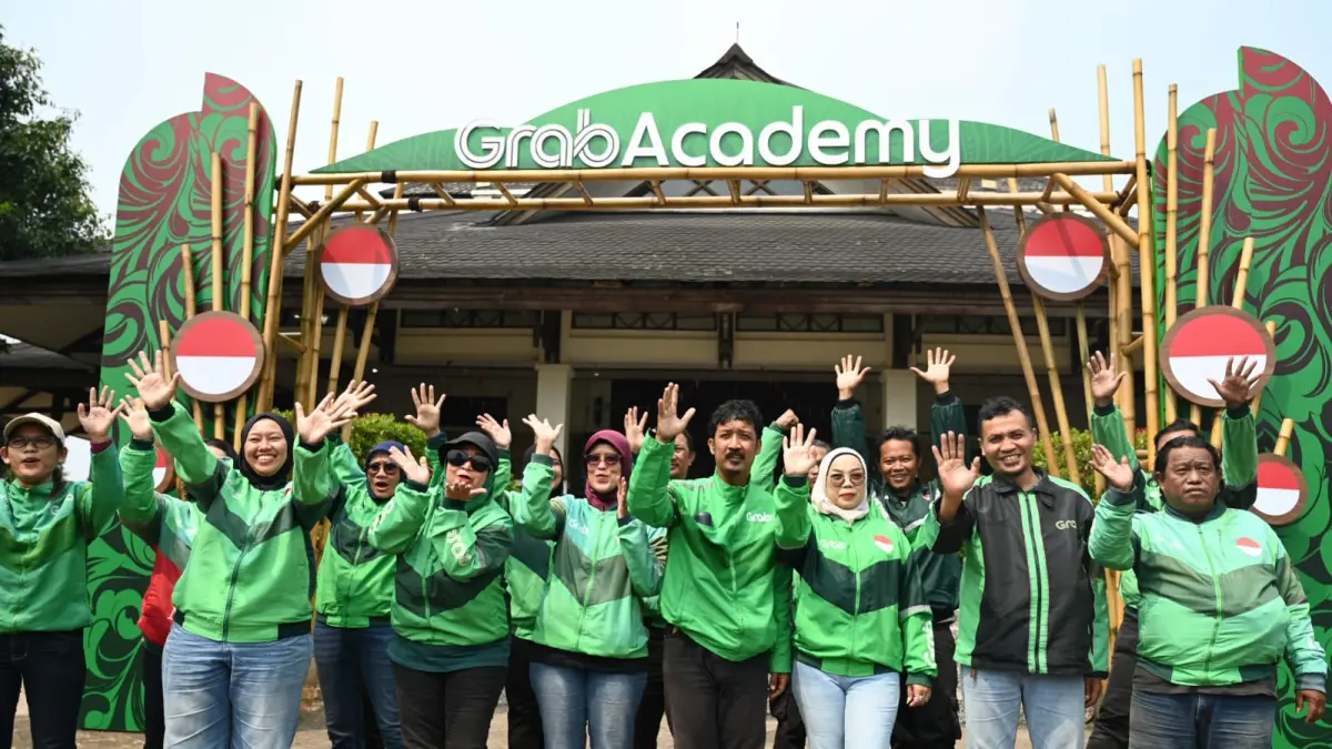 Antusiasme Mitra Pengemudi dalam menyambut peluncuran GrabAcademy: Peluang Tanpa Batas untuk Mitra Naik Kelas di Padepokan Pencak Silat TMII, Jakarta, Selasa (11/8).