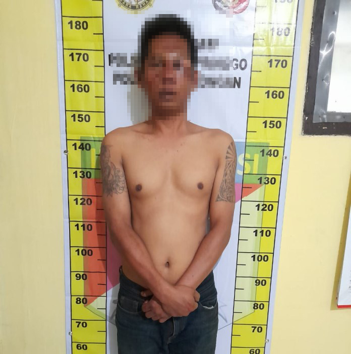 Pelaku Wahyudin ketika diamankan di Polsek Wonopringgo Rabu (3/3/2021). (Istimewa)