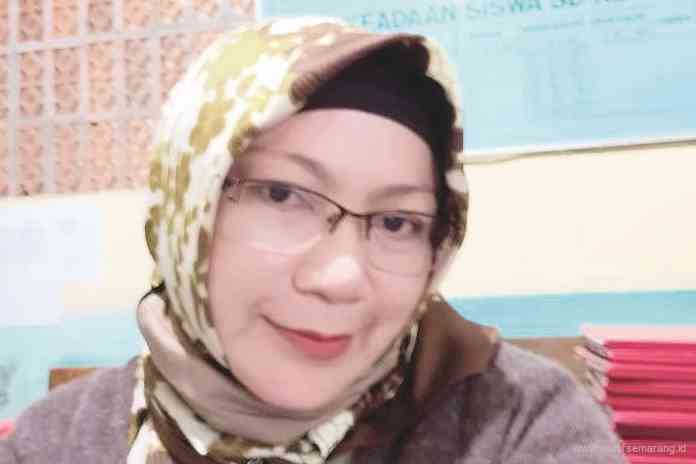 Wiharti, S.Pd