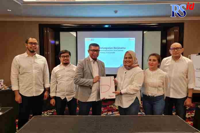 JALIN KERJA SAMA : (Kiri-kanan) Chief Marketing Officer POSFIN Riano Bayu Satria, Chief Operating Officer POSFIN Sandi Mardiansyah, Chief Executive Officer POSFIN Setyo Budianto, Direktur Business & Marketing Finnet Irena Aldanituti, GHO Trading &