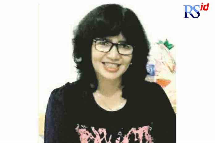 Dra. Indartik, M.Pd.