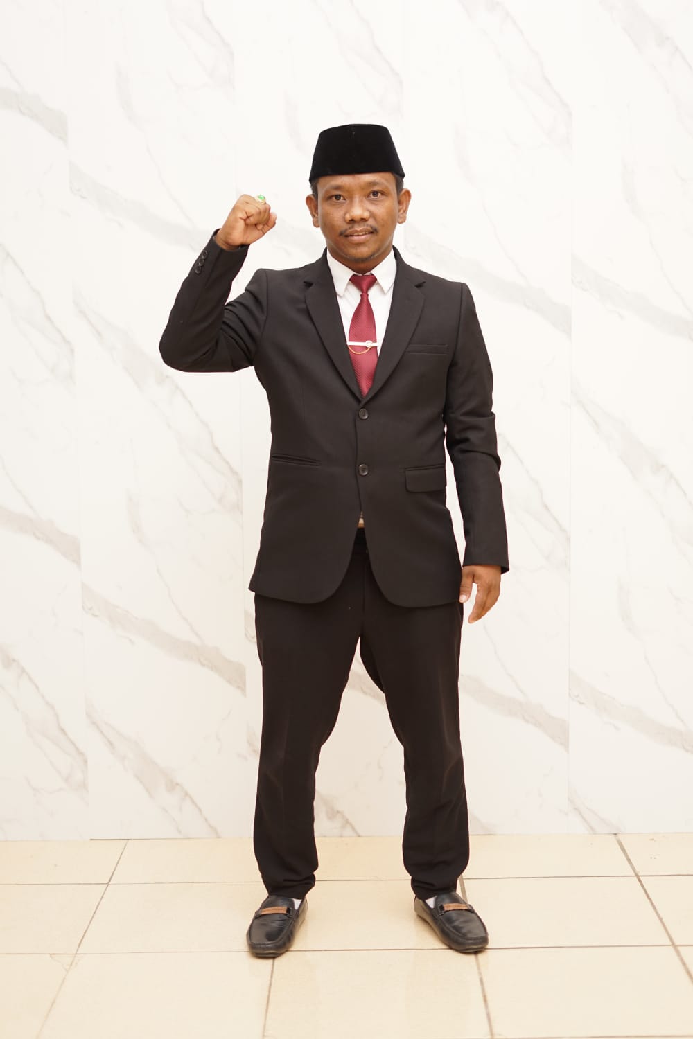 Kordiv Sosdiklih Parmas dan SDM KPU Bangkalan Qomaruddin.