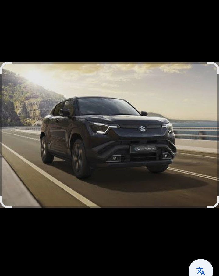 Suzuki e Vitara tampil dengan garis bodi tegas dan proporsi yang kokoh.
