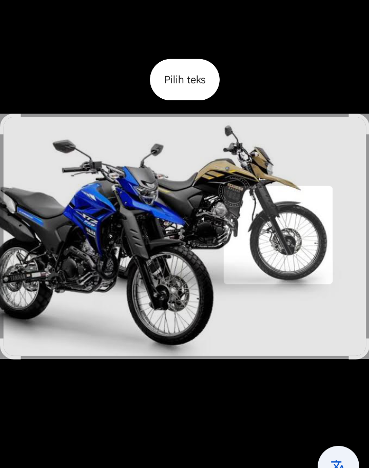 motor dual purpose 250 cc ini menonjolkan garis bodi tegas dan postur jangkung yang memberi kesan tangguh.