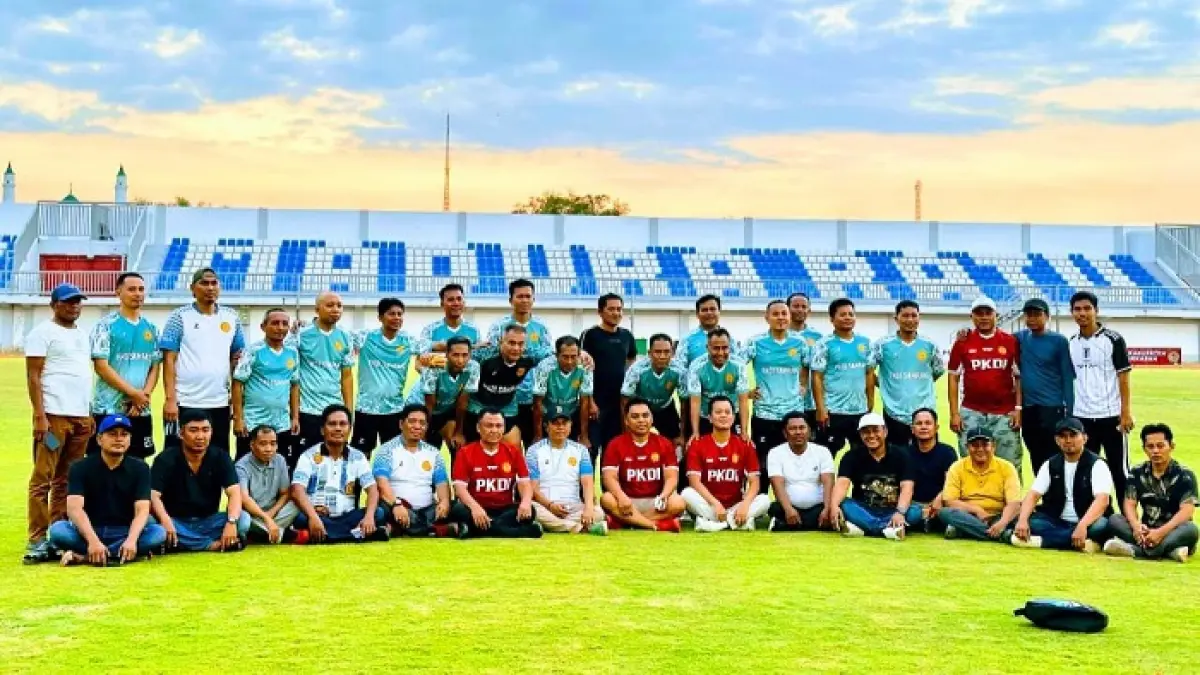 MENANG: Tim PKDI Sampang berpose bersama usai memenangkan pertandingan melawan tim PKDI Pamekasan di SGMRP Pamekasan, Senin (10/8). (PKDI UNTUK JPRM)