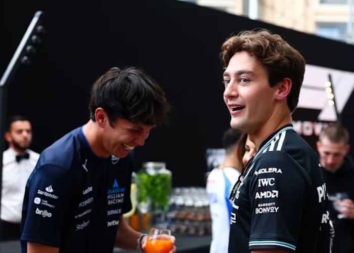 George Russell frustrasi di F1 GP Monako 2025 usai tersangkut di belakang Sainz dan Albon.