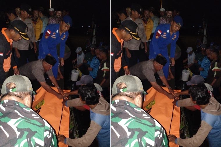 LAKA LAUT: Tim gabungan TNI dan Polri mengevakuasi jenazah nelayan yang meninggal akibat terseret jaring di Pelabuhan Muncar, Jumat malam (19/9).