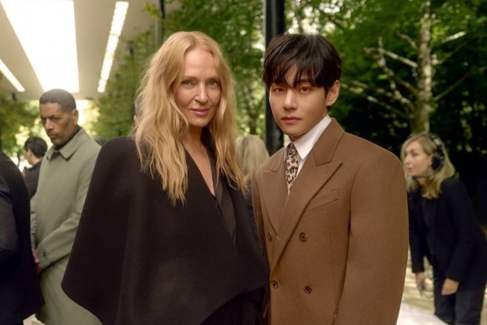 Momen manisnya bersama Uma Thurman viral di media sosial.
