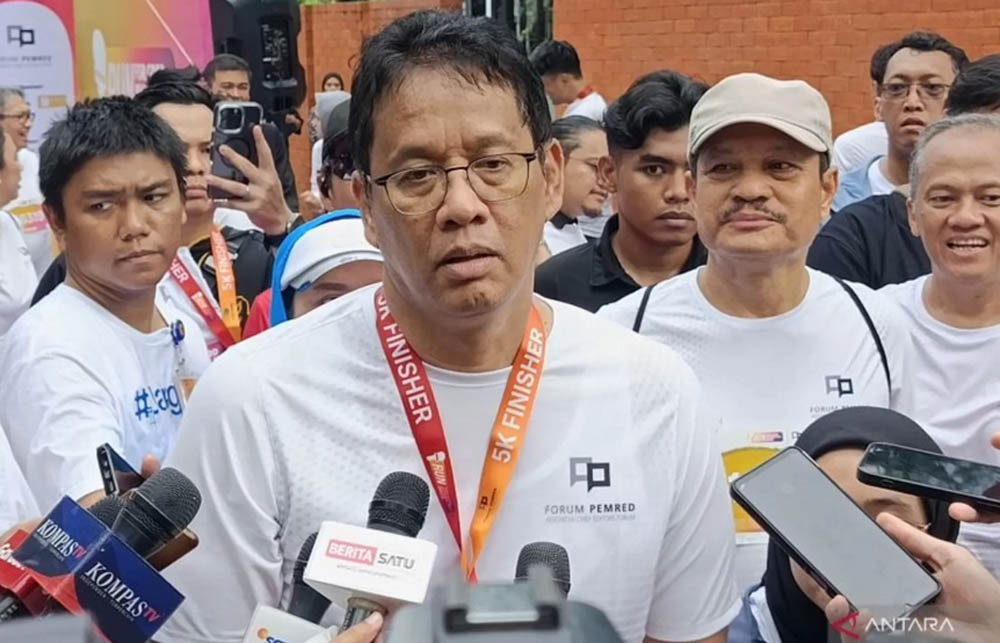 Menteri Keuangan Purbaya Yudhi Sadewa di ajang Run For Good Jurnalism 2025, Jakarta, Minggu (16/11/2025).