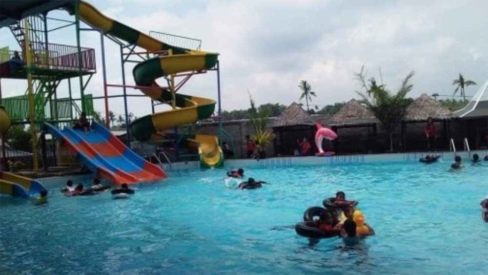 Barokah Park di Desa Trigonco, Asembagus, Situbondo, hadir sebagai destinasi wisata keluarga dengan wahana, taman hijau, dan kolam renang.