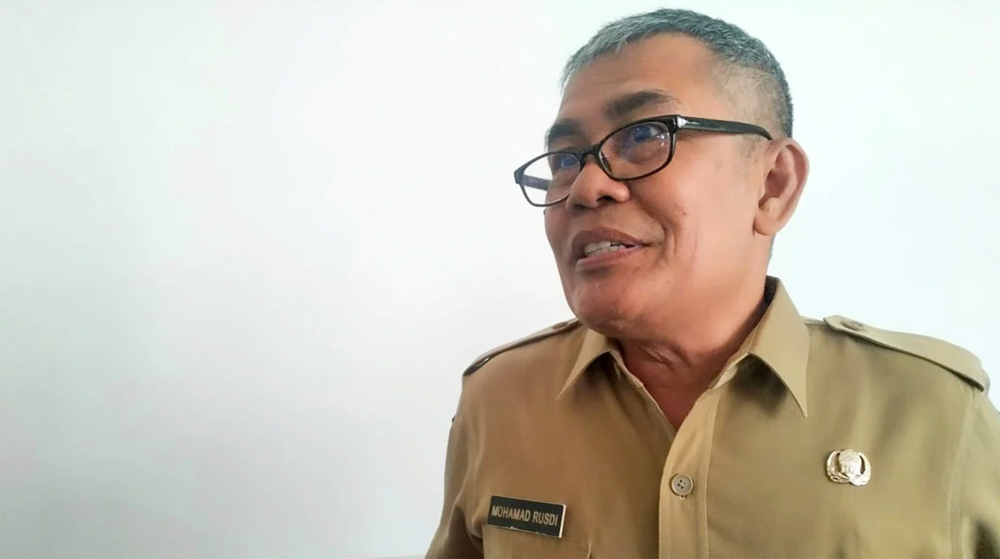 Muhammad Rusdi, Kepala Bidang Hubungan Industrial Disnakertransperin Banyuwangi