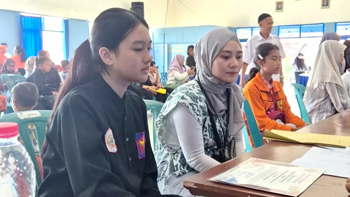 Sebanyak 5.134 siswa mendaftar jalur prestasi akademik SPMB Banyuwangi 2025. TKA menjadi faktor baru penentu seleksi masuk SMP negeri. (M Ksatria Raya/Radar Banyuwangi)