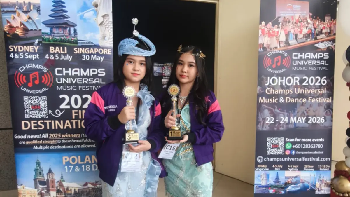 Cherie dan Vivianne Wangsa, sukses meraih juara di festival vokal internasional di Malaysia. (banyuwangitourism.com)