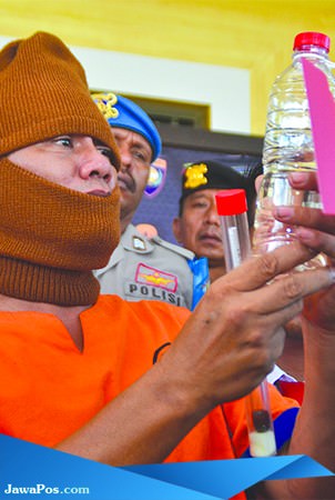 pengedar-arak-tutup-merah-tersangka