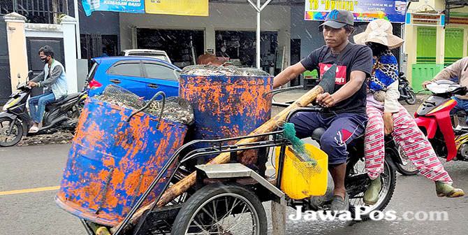 becak-motor-bisa-angkut-orang-dan-ikan