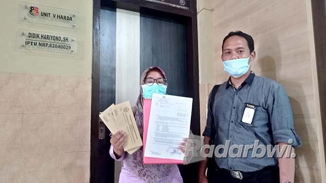 Kuasa hukum Wastiti Putri Septian, Moh. Firdaus. Kades Kenjo dipolisikan mitra kerja.