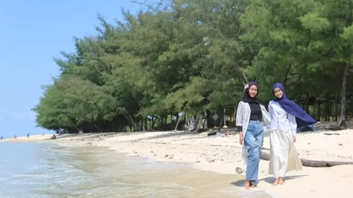 Ilustrasi liburan di Pantai&nbsp;(M. MAHFUDZ MUNTAHA/RADAR TUBAN)